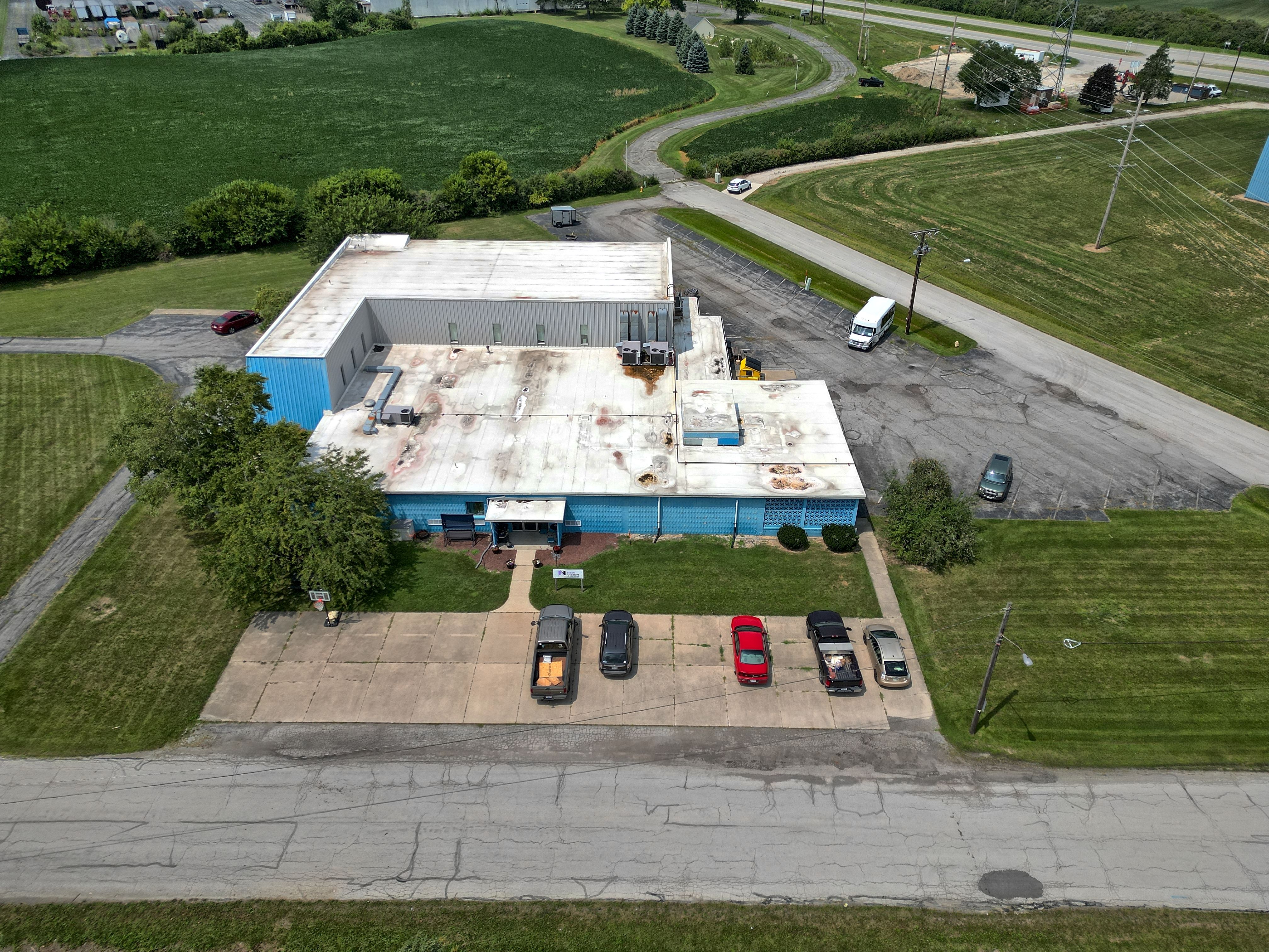 An aerial view of a commercial building.